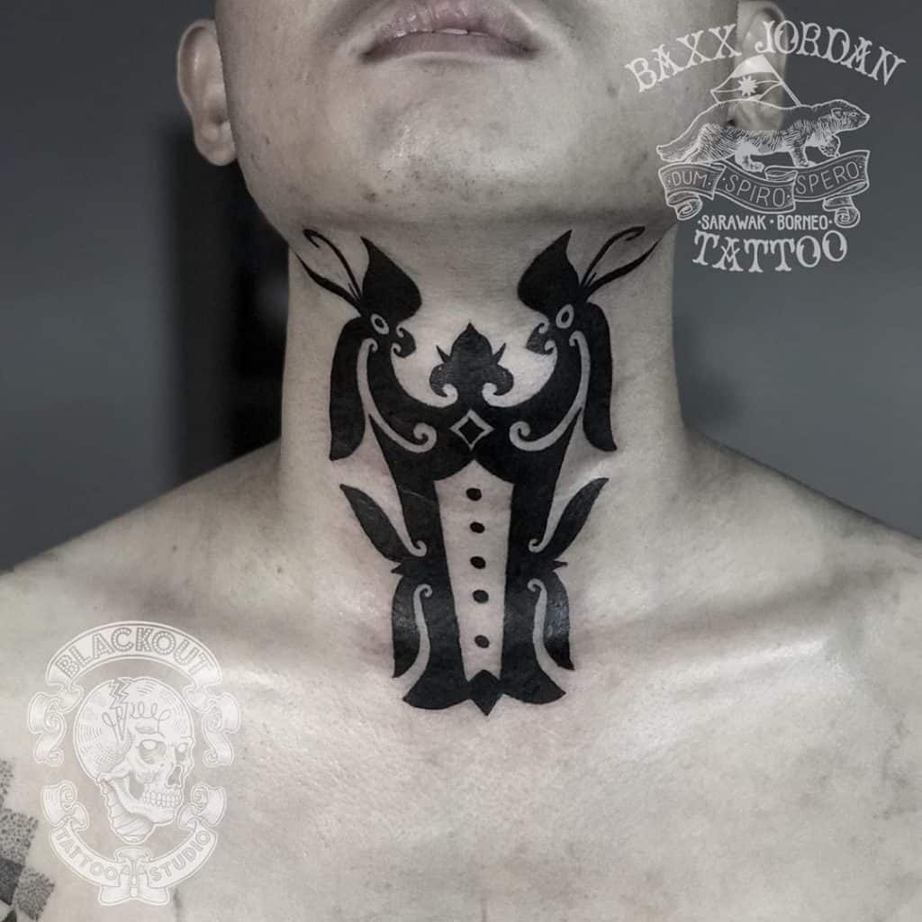 Dayak tattoo on the neck