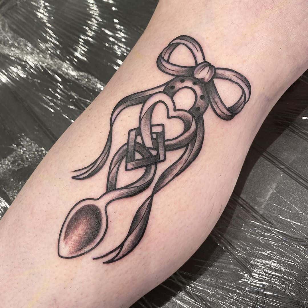 Love Spoon Tattoos: Meanings, Common Themes & More