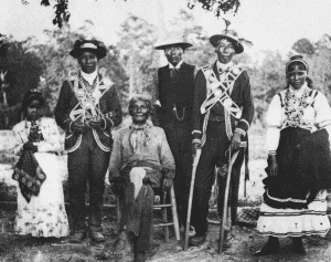 Choctaw people wearing traditional clothes