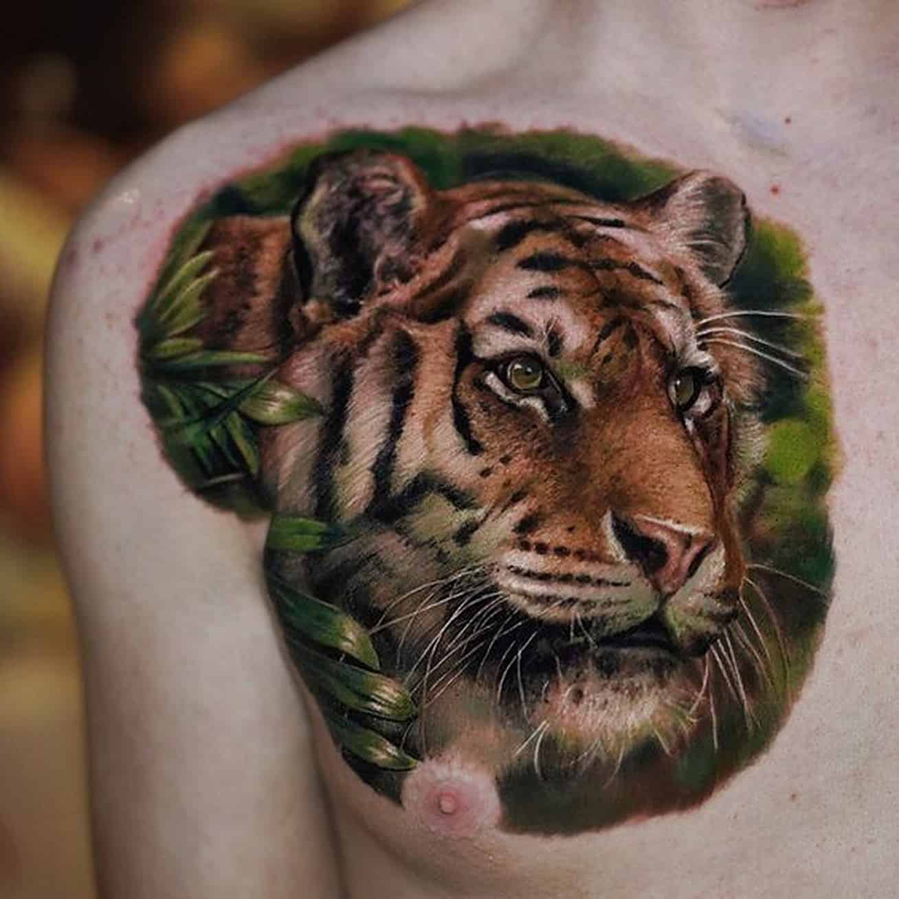 Tiger fighting a snake tattoo idea | TattoosAI