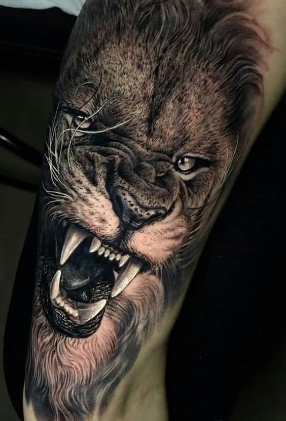 Black And Grey Lion Tattoo