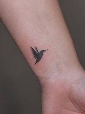 Black-work Hummingbird Tattoo