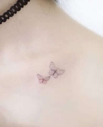 Butterfly Tattoo on Collarbone