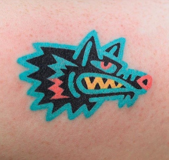 Contemporary Wolf Tattoo