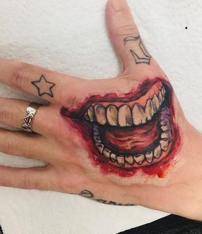 Joker Tattoo Hand Smile