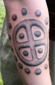 Sun Cross Tattoo