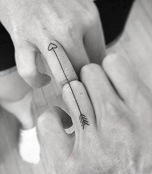 Heart and Arrow Tattoo on the Finger