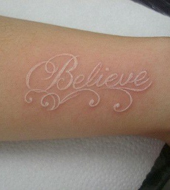 White Ink Lettering Tattoo