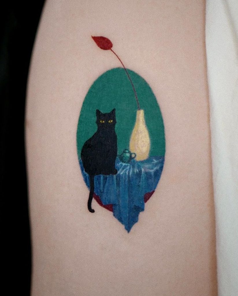 Small Black Cat Tattoo