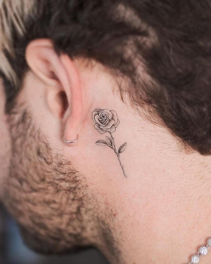 Small Rose Tattoo behind the Ear