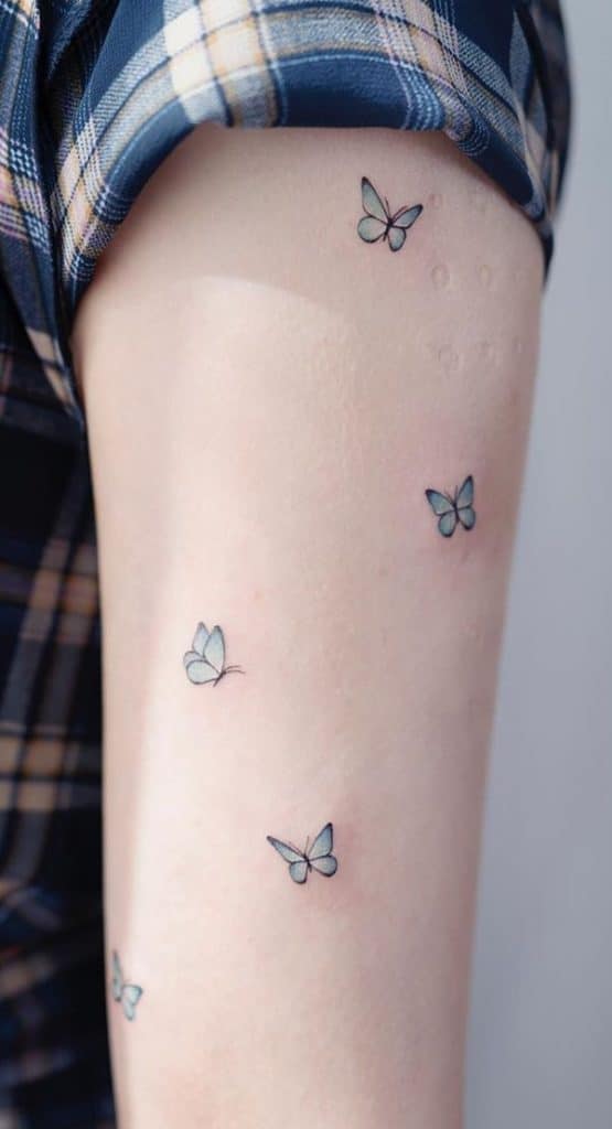 Minimalist Blue Butterfly Tattoo