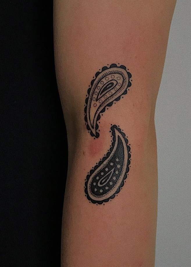 simple small paisley tattoo