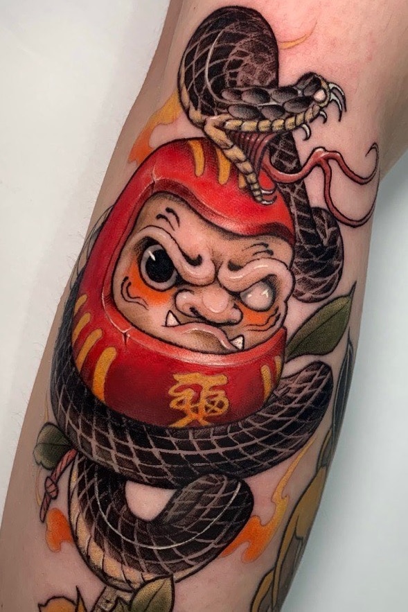 Daruma Doll Tattoo with Snake Tattoo