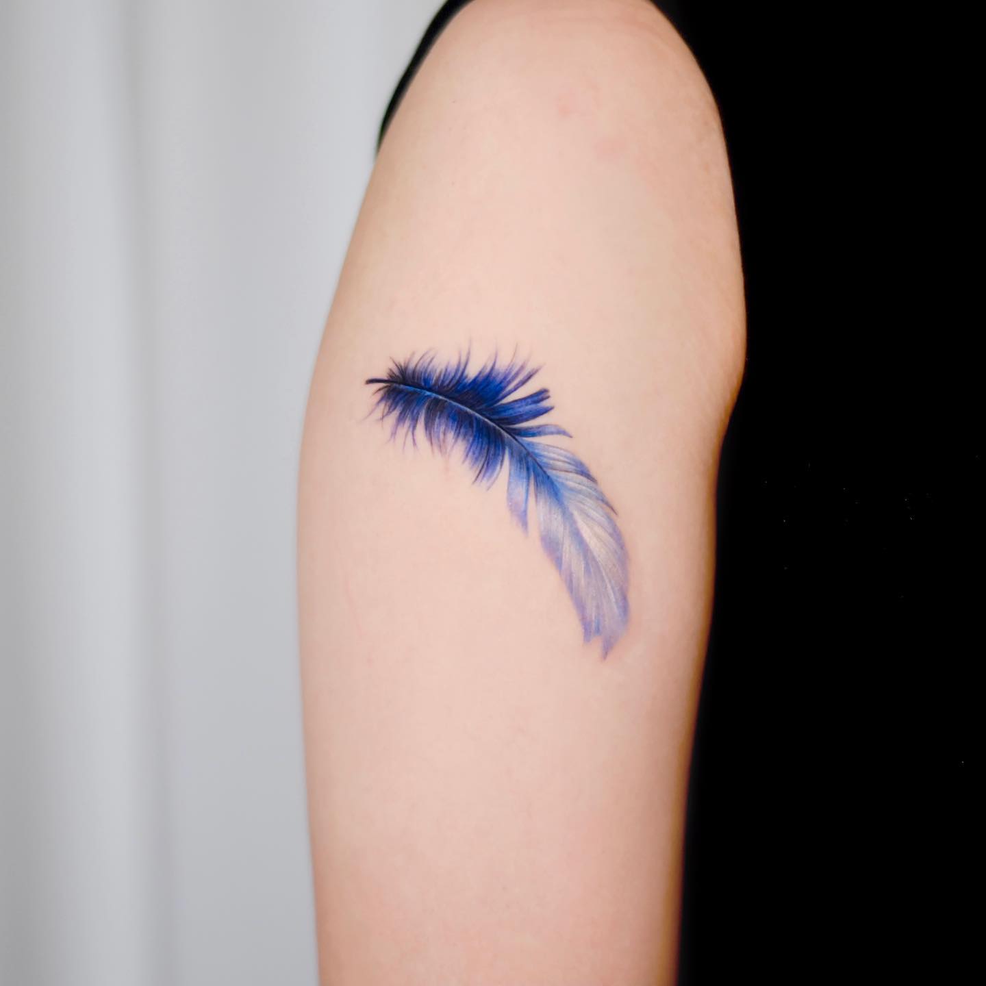 Liam Payne's Feather Tattoo on His Arm- PopStarTats